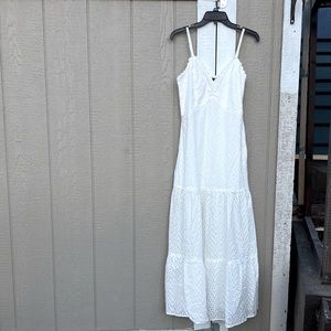 Pure white long maxi dress w/cuts out & w/adjustable straps by Aqua.  Never worn